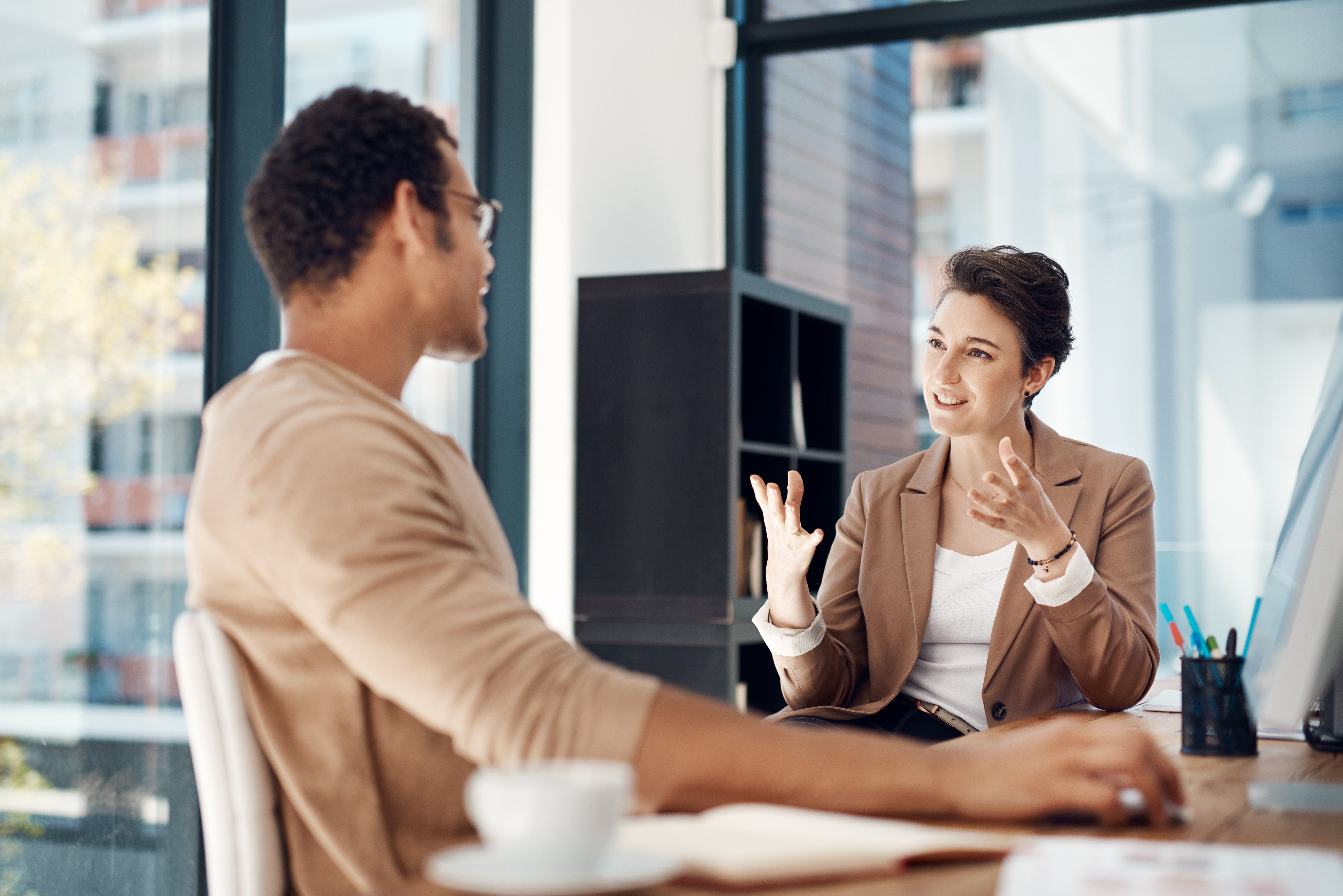 man and woman talking