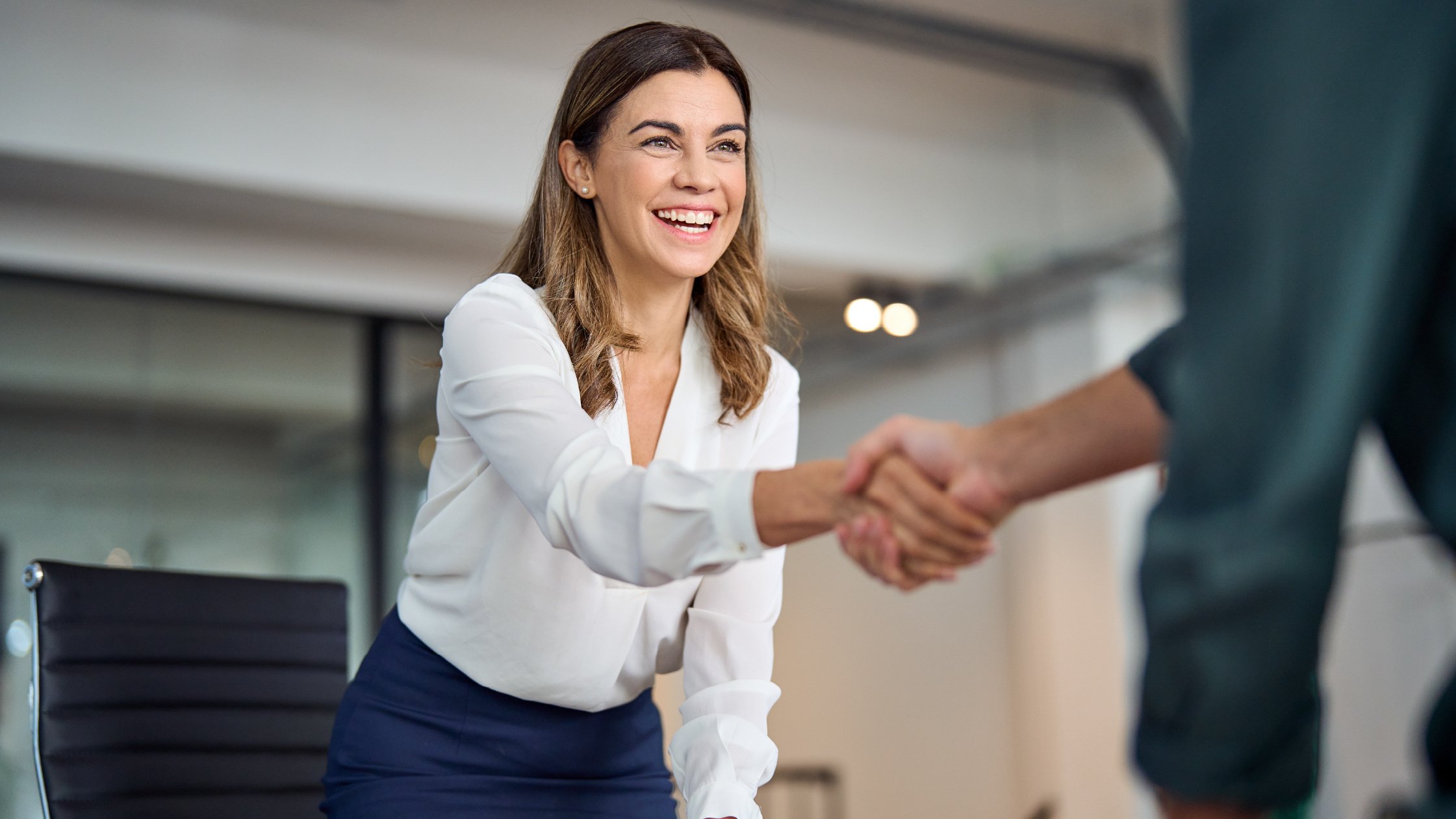 woman shaking hand